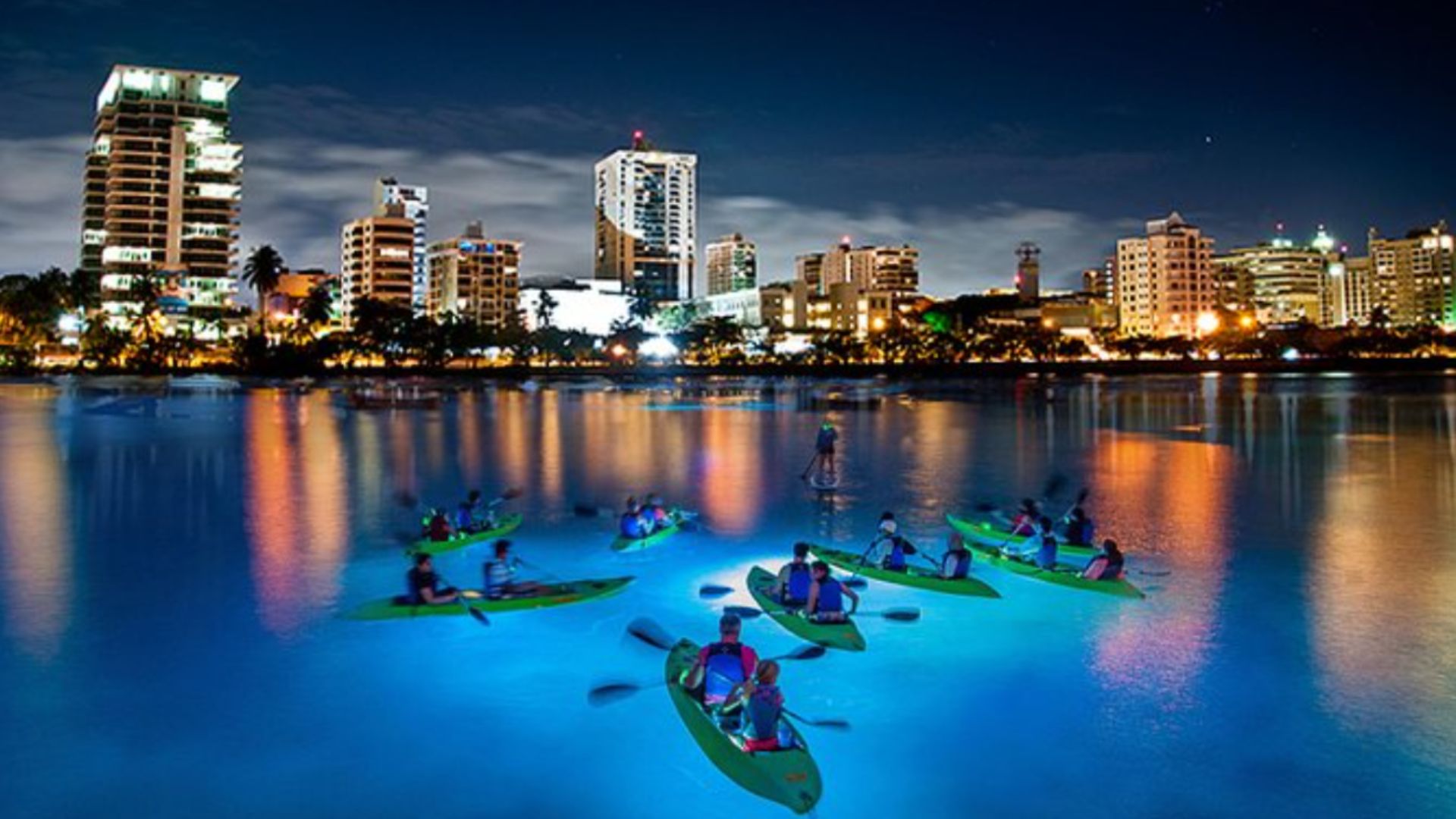 Experience San Juan’s LED Night Kayaking: Condado Lagoon Glow with SUP And Scenic Views