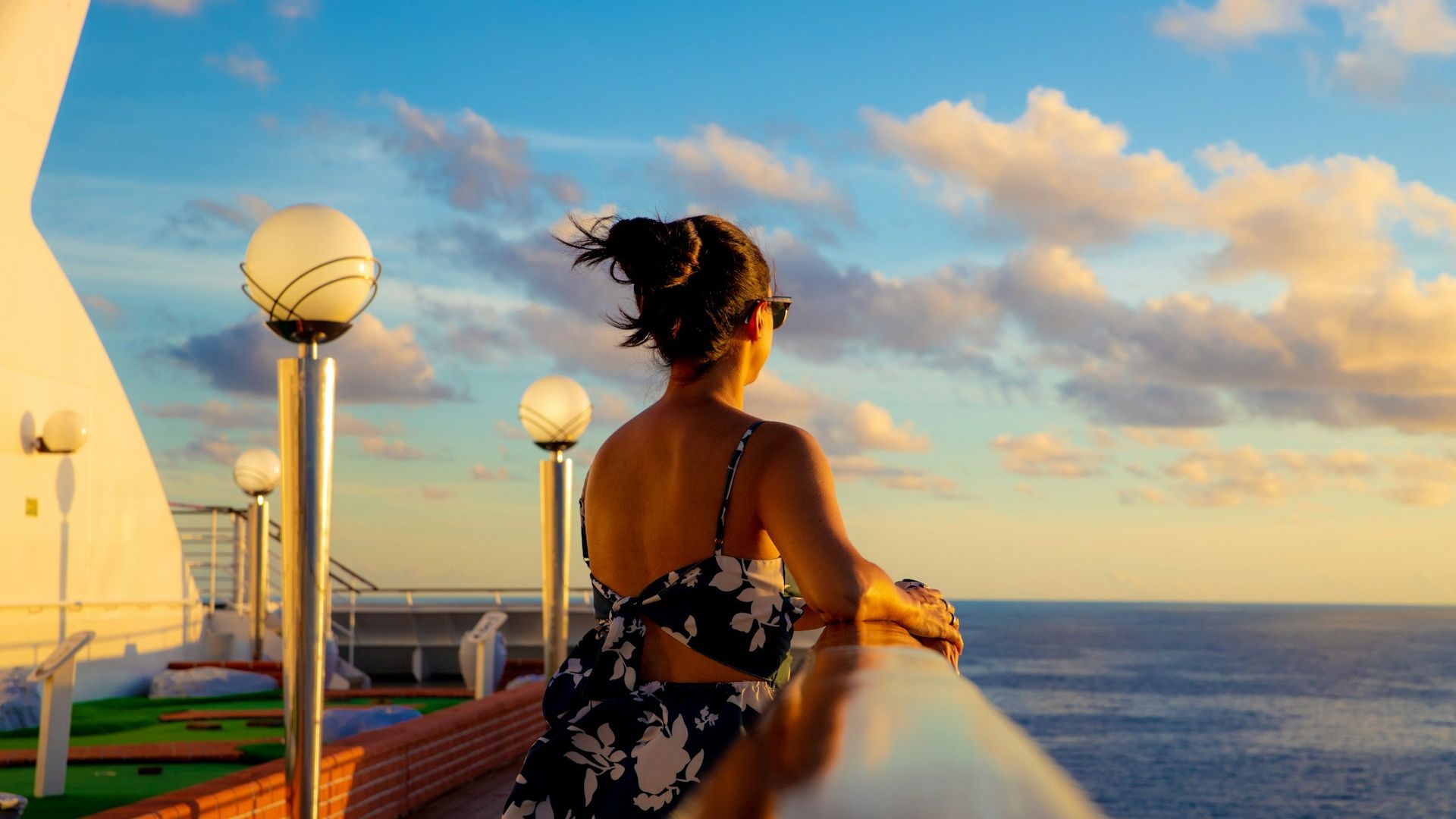 woman on deck vinicius unsplash
