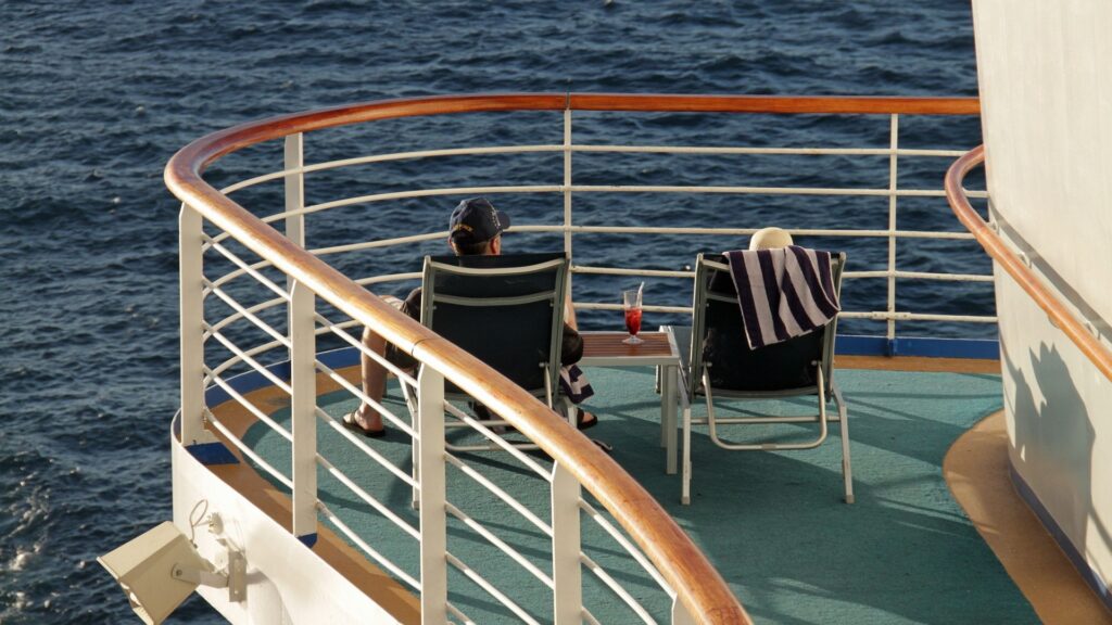 2 people relaxing on cruise ship