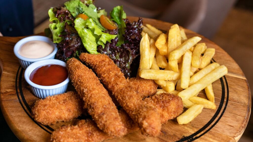 fried chicken fries and salad on tray