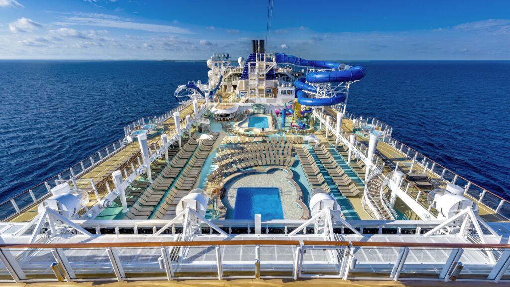 pool deck of cruise ship with water slide
