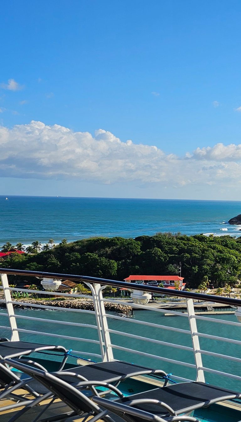 island viewed from deck of cruise ship